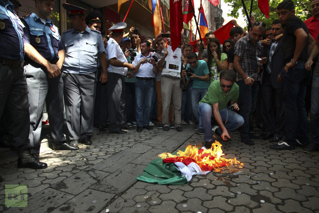 protesters-burn-hungarian-national