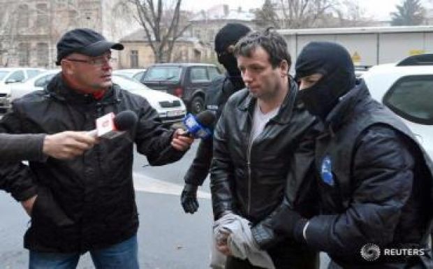 Beismerte bűnösségét Guccifer, a hírhedt román hacker
